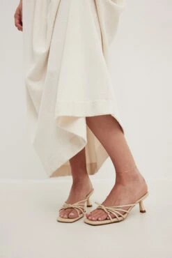 Knotted Front Strappy Mules -Na-Kd knotted front stappy mules 1055 001422 0301 pointy chunky eye sunglasses 1015 004939 0002 twisted handle woven handbag 1015 004885 0002 361491