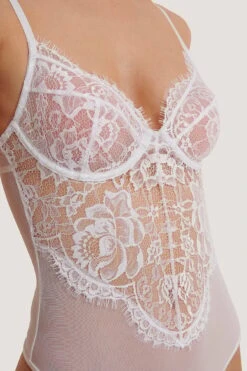 Raw Edge Lace Cup V-String Bodysuit 13 Raw Edge Lace Cup V-String Bodysuit -Na-Kd nakd raw edge lace cup v string bodysuit 1013 000641 0001 06g