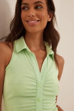 NA-KD Sleeveless Rouched Button Dress 17 NA-KD Sleeveless Rouched Button Dress -Na-Kd sleeveless rouched button dress 1100 006487 11302400